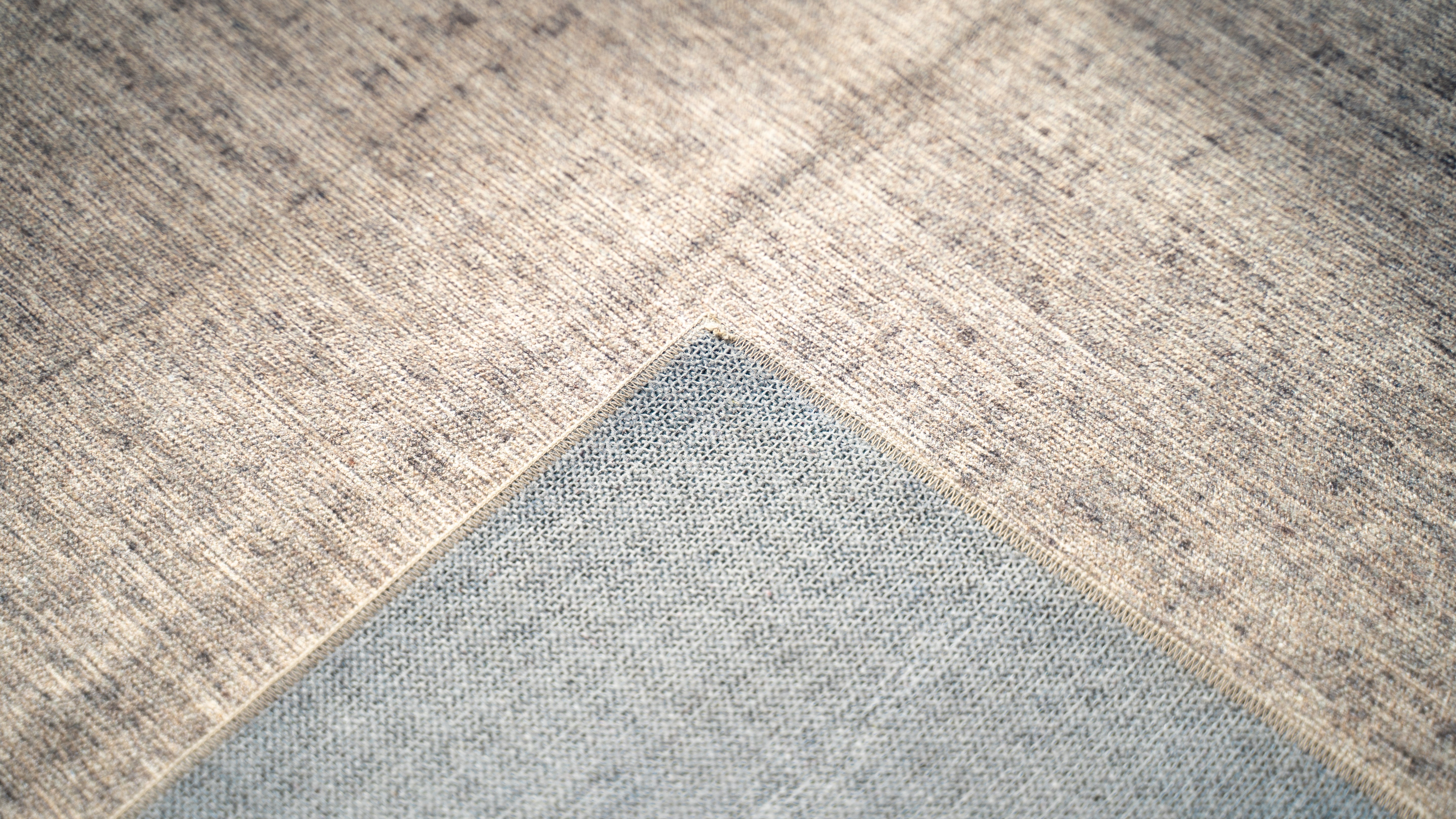 Tapis d'extérieur beige avec sac